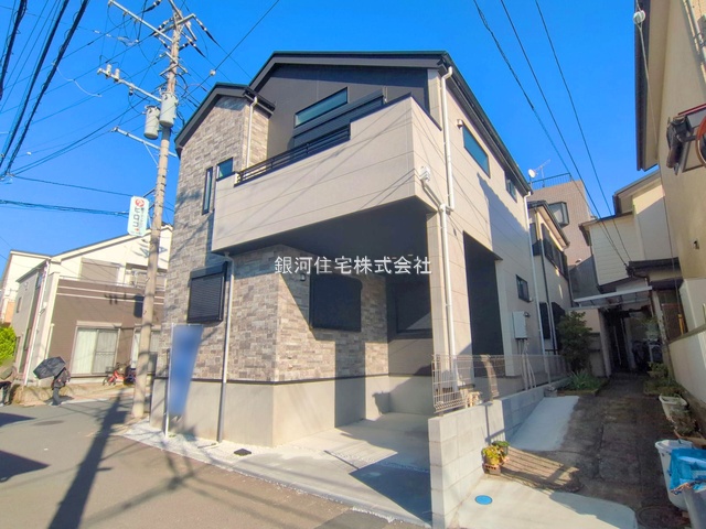 打戻